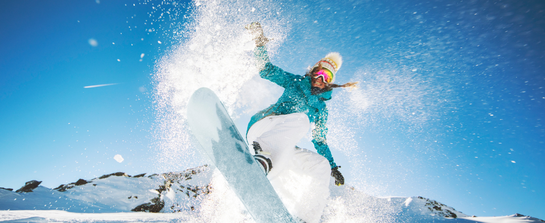 Snowboarder shredding the snow